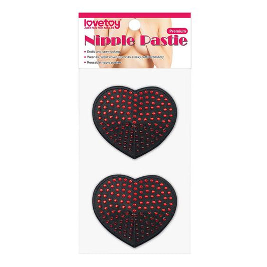 Copricapezzoli a forma di cuore con strass rossi